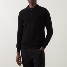 Model wearing Boggi Milano Tech Half-Zip Sweater in black, featuring half-zip collar, long sleeves and ribbed trims, styled with black trousers.