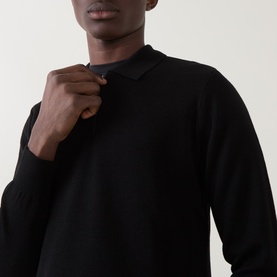 Model wearing Boggi Milano Tech Half-Zip Sweater in black, showing half-zip fastening detail at collar, long sleeves and ribbed trims.