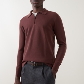 Model wearing Boggi Milano Tech Half-Zip Sweater in brick red, styled with grey trousers and a brown belt.