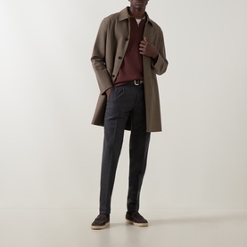 Model wearing Boggi Milano Tech Half-Zip Sweater in Brick Red, styled with a camel overcoat, dark trousers, and grey suede shoes.