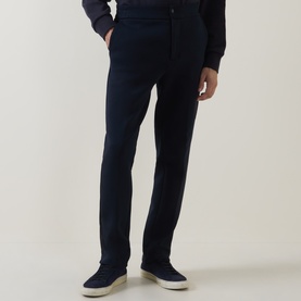 Model wearing Boggi Milano Light Scuba Cargo Sweatpants in navy blue, styled with white trainers and a navy top.