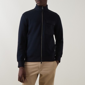 Model wearing Boggi Milano Light Scuba Zip Sweatshirt in navy blue, funnel neck, full-length zip, contrast patch chest pocket, styled with beige