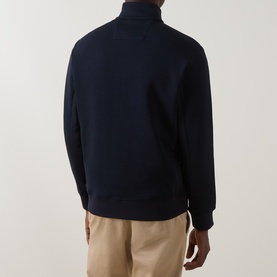 Model wearing Boggi Milano Light Scuba Zip Sweatshirt in navy blue with funnel neck and zip fastening, styled with beige chinos. Back view.