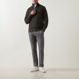Model wearing Boggi Milano Technical Half-Zip Sweatshirt in Military Green with funnel neck, styled with grey trousers and white trainers.