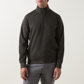 Model wearing Boggi Milano Technical Half-Zip Sweatshirt in Military Green, featuring funnel neck and half-zip placket, styled with grey trousers.