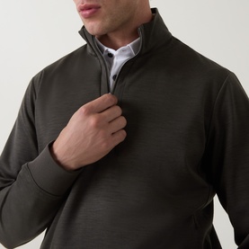 Model wearing Boggi Milano Technical Half-Zip Sweatshirt in Military Green, funnel neck with half-zip placket, styled over a white collared shirt.