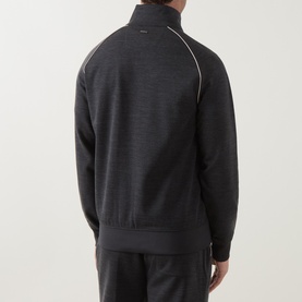 Model wearing Boggi Milano charcoal sweatshirt, back view, with contrast white piping detail and zip neckline, styled with matching joggers.