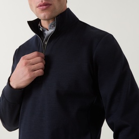 Model wearing Boggi Milano Technical Half-Zip Sweatshirt in navy blue, funnel neck, half-zip placket, styled with a checked shirt underneath.