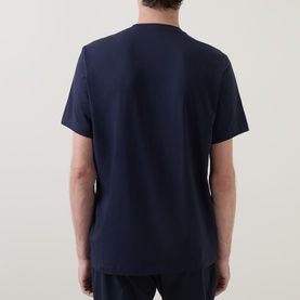 Model wearing Boggi Milano Supima Solid T-Shirt in navy, showing rear view with round neck, short sleeves and straight hemline.