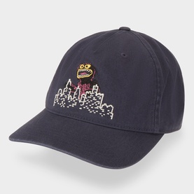 Carhartt cap in Shady Purple, 100% cotton with embroidered monster and city skyline graphic on front, curved brim