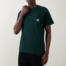 Model wearing Carhartt Crew Neck T in Dark Scarab green, with small logo chest pocket, paired with black trousers.