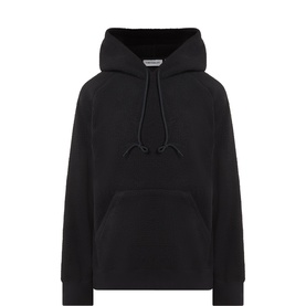 Carhartt black pullover hoodie with kangaroo pocket, drawstring hood, and tonal embossed chest graphic, in 100% polyester fleece