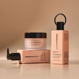 Champo Pitta Repair Hair Mask with coordinating shampoo and packaging in soft peach tones on warm beige background
