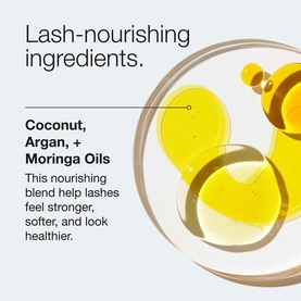 Clinique High Impact High-Fi Full Volume Waterproof Mascara ingredient close-up showing golden coconut, argan and moringa oils in a glass bowl.