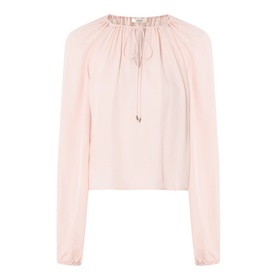 FRAME DENIM silk blouse in Taffy pink with gathered neckline, tie detail, and elasticated cuffs