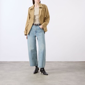 Model wearing FRAME DENIM Straight Jeans in Coastal light blue denim, styled with a tan jacket, cream top and black ankle boots
