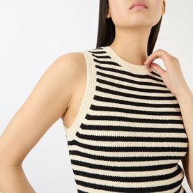 Model wearing FRAME DENIM Coastal Stripe Tank Top in Cream Multi, close-up of ribbed knit stripe detail and round neckline