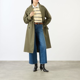 Model wearing FRAME DENIM Le Slim Palazzo High-Rise Wide Leg Jeans in Archive, styled with a khaki trench coat, striped polo and black ankle boots.