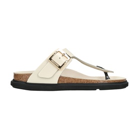 Birkenstock cream leather toe-post sandal with gold-tone buckle, cork footbed, and black chunky sole