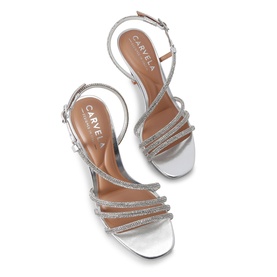 Carvela silver strappy sandals with crystal-embellished toe straps, slingback ankle strap, and slim heel, overhead flat lay view.