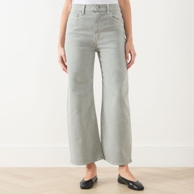 Model wearing Paige Arellia Ankle Wide-Leg Jeans in Vintage Seaglass, mid-rise with wide-leg silhouette, styled with black loafers