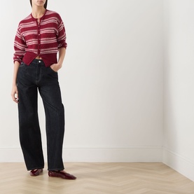Model wearing Samsoe & Samsoe Dry Rose stripe mohair-blend cardigan with black wide-leg jeans and burgundy loafers.