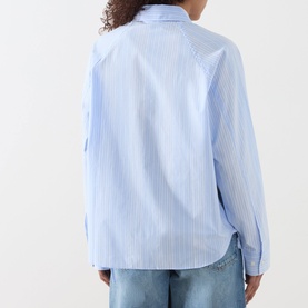 Model wearing Samsoe & Samsoe Sarita Striped Shirt in Windsurfer St, rear view showing neck yoke seam and curved hem, styled with blue jeans