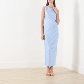 Model wearing Samsoe & Samsoe windsurfer blue pleated maxi skirt, styled with a matching sleeveless top and nude heeled sandals.