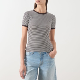 Model wearing Samsoe & Samsoe T-shirt in Mulch stripe, fine horizontal stripes with contrast crew neck and cuffs, styled with light blue jeans.