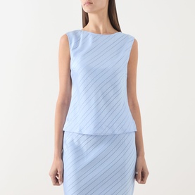 Model wearing Samsoe & Samsoe Saagne Tonal Striped Blouse in Windsurfer, sleeveless with wide round neckline, diagonal stripe, styled with matching