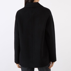 Model wearing Anine Bing black wool-cashmere jacket, rear view showing relaxed fit and centre back seam detail.
