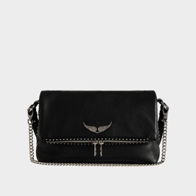 Zadig black leather crossbody bag with silver chain strap, studded trim, and winged logo hardware on flap