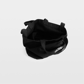 Zadig black canvas tote bag, top-down view showing open interior and branded logo on side panel