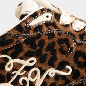 Zadig brown leopard print pony hair trainer close-up showing embroidered ZV monogram and cream laces