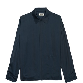 Zadig blue long-sleeve shirt with pointed collar, concealed button placket, and small embroidered detail at hem
