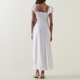 Model wearing LOVESHACKFANCY Ivory Rose floral midi dress, rear view, featuring puff sleeves, square neck and fitted bodice