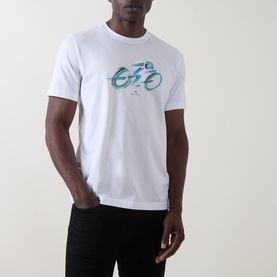 Model wearing Paul Smith Cycle Logo T-Shirt in white with teal cyclist graphic print, paired with black trousers.
