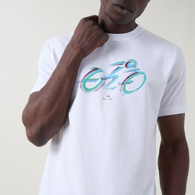 Model wearing Paul Smith Cycle Logo T-Shirt in white, with multicoloured cyclist graphic print at chest, crew neckline visible