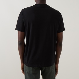 Model wearing Paul Smith Mushrooms Logo T-Shirt in black, shown from the back. Short sleeves, crew neck, straight hemline.
