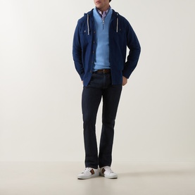 Model wearing Paul Smith Light Blue Cotton Half Zip, styled with navy zip hoodie, check shirt, dark jeans and white trainers.