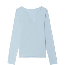 Zadig blue long-sleeve top with V-neckline, button placket detail, and ribbed cuffs, laid flat