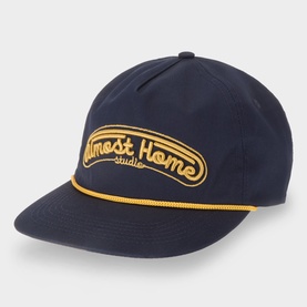 Almost Home AH Studio Logo Baseball Cap in navy with gold embroidered logo, contrast rope trim, flat peak and six-panel construction