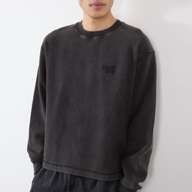 Model wearing Almost Home Porto Black cotton crew neck sweatshirt with ribbed texture and tonal logo patch, styled with matching trousers