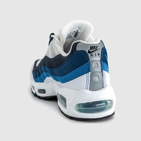 Nike Air Max 95 trainer in white, emerald green and lake blue, shown from rear three-quarter angle with visible Air unit sole