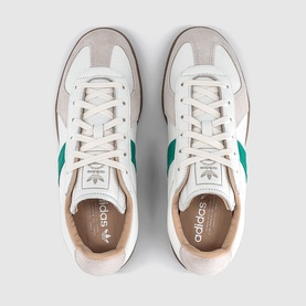 Adidas trainers in white and power green, overhead view showing lace-up front, suede and leather panelling with beige insole