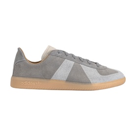 Adidas grey suede low-top trainer with white stripe, cream heel tab, and gum rubber sole