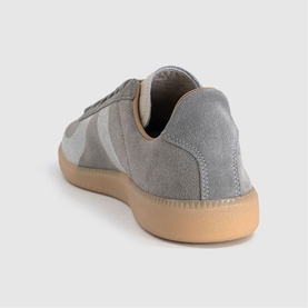 Adidas grey suede trainer, heel and side view, with white stripe detail and gum rubber sole
