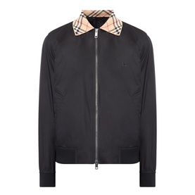 Burberry Glenfields Harrington Jacket in black with signature check collar, two-way zip, ribbed cuffs and tonal Knight motif