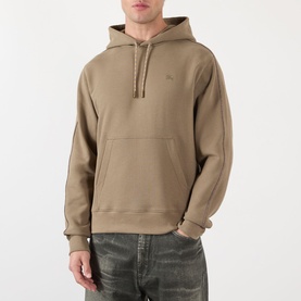Model wearing Burberry finch brown cotton hoodie with tonal drawstring, kangaroo pocket and embroidered logo chest detail