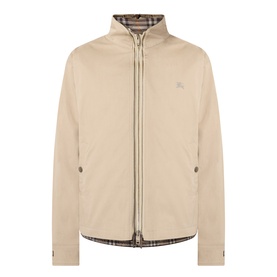 Burberry saltmarsh beige cotton zip-up jacket with equestrian knight logo, stand collar, and check-lined hem detail